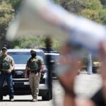 Dozers said that they asked federal agents to leave the parking lot